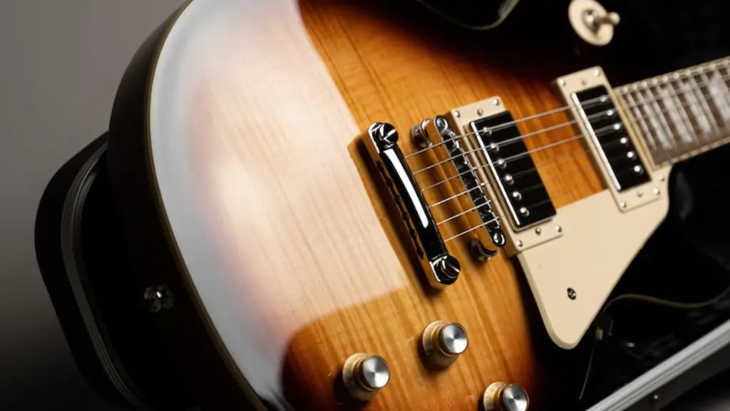 How to do artificial harmonics on electric guitar