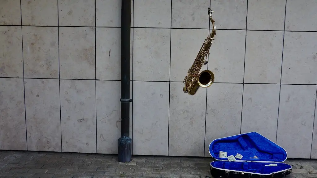 What was the first saxophone made of?