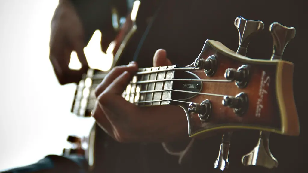 How do you string an electric guitar?